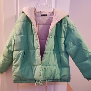 Reversible puffer jacket with snap buttons. Size- XL.